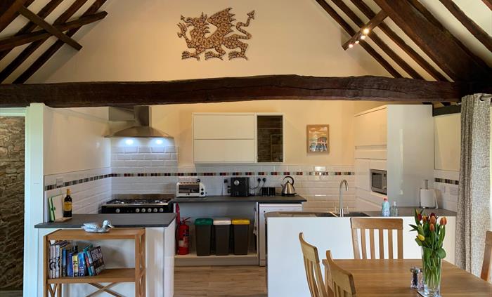 The Longhouse at Hilltops Brecon Holiday Cottages has a fully equipped kitchen, gas cooker and hob, microwave, fridge, freezer, Nespresso machine and